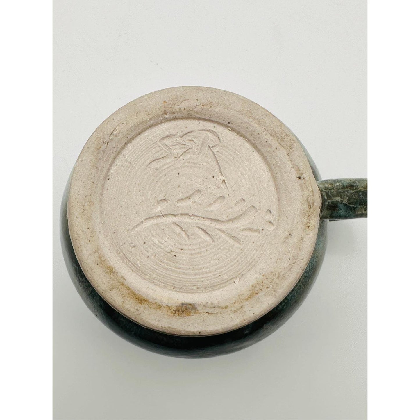 Handmade Artisan Pottery Mug – Blue Green Glaze with Raised Decorative Pattern