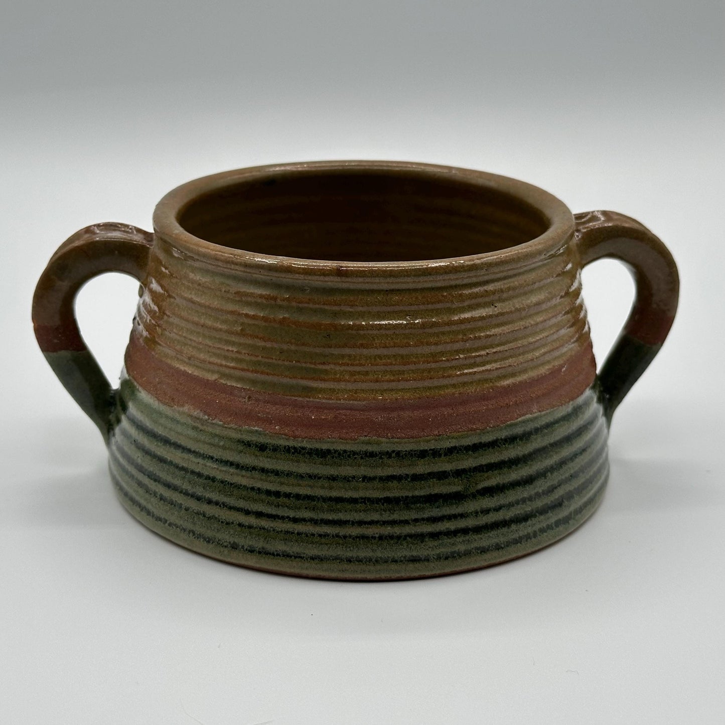Handcrafted Rustic Stoneware Bowl: Dual-Handled Ceramic Vessel with Earth-Tone Stripes for Soup & Decor