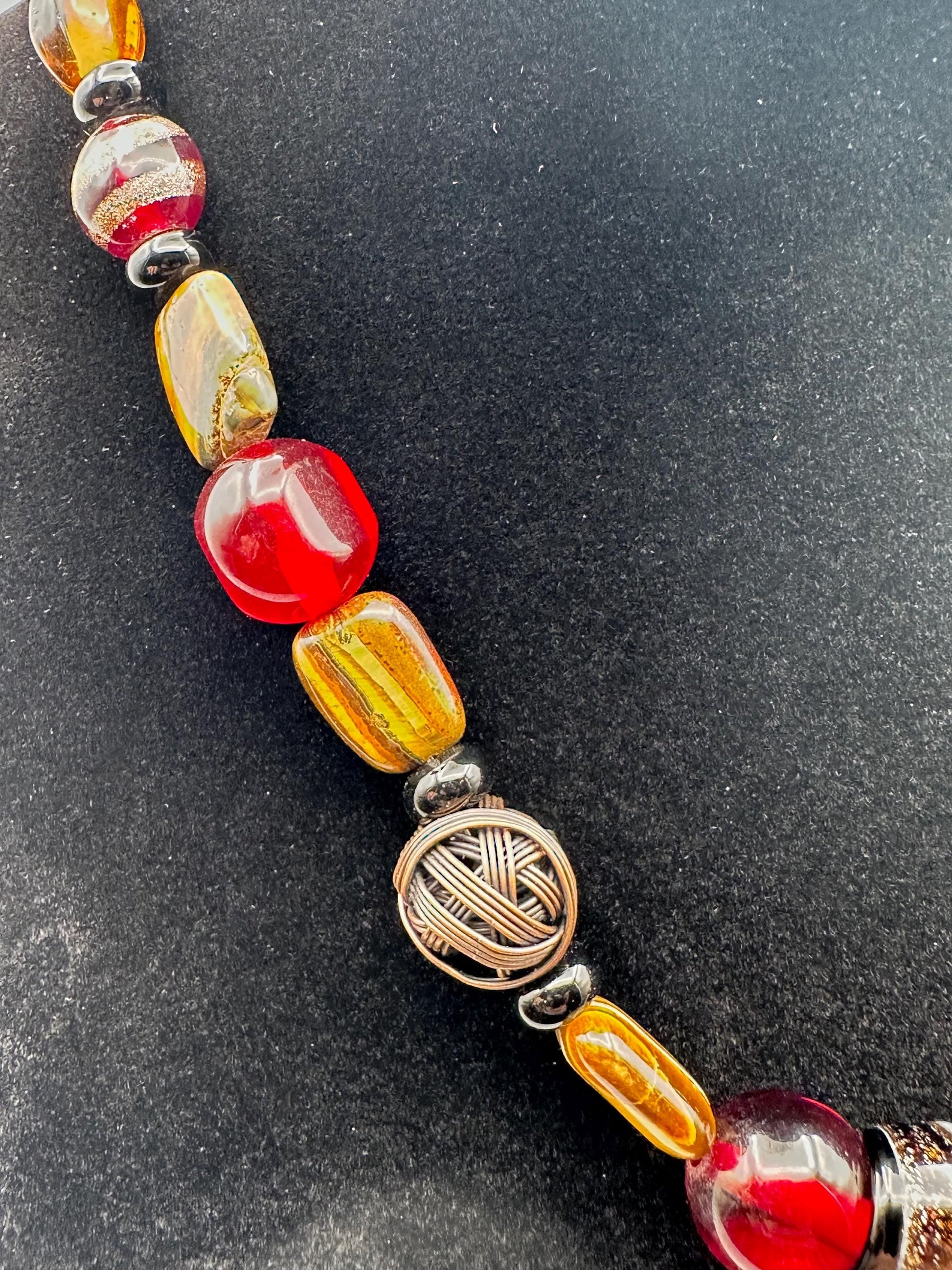 Vintage Murano-Style Glass Bead Necklace: Swirl Leaf Pendant in Amber, Red & Black - Artisan Bohemian Jewelry