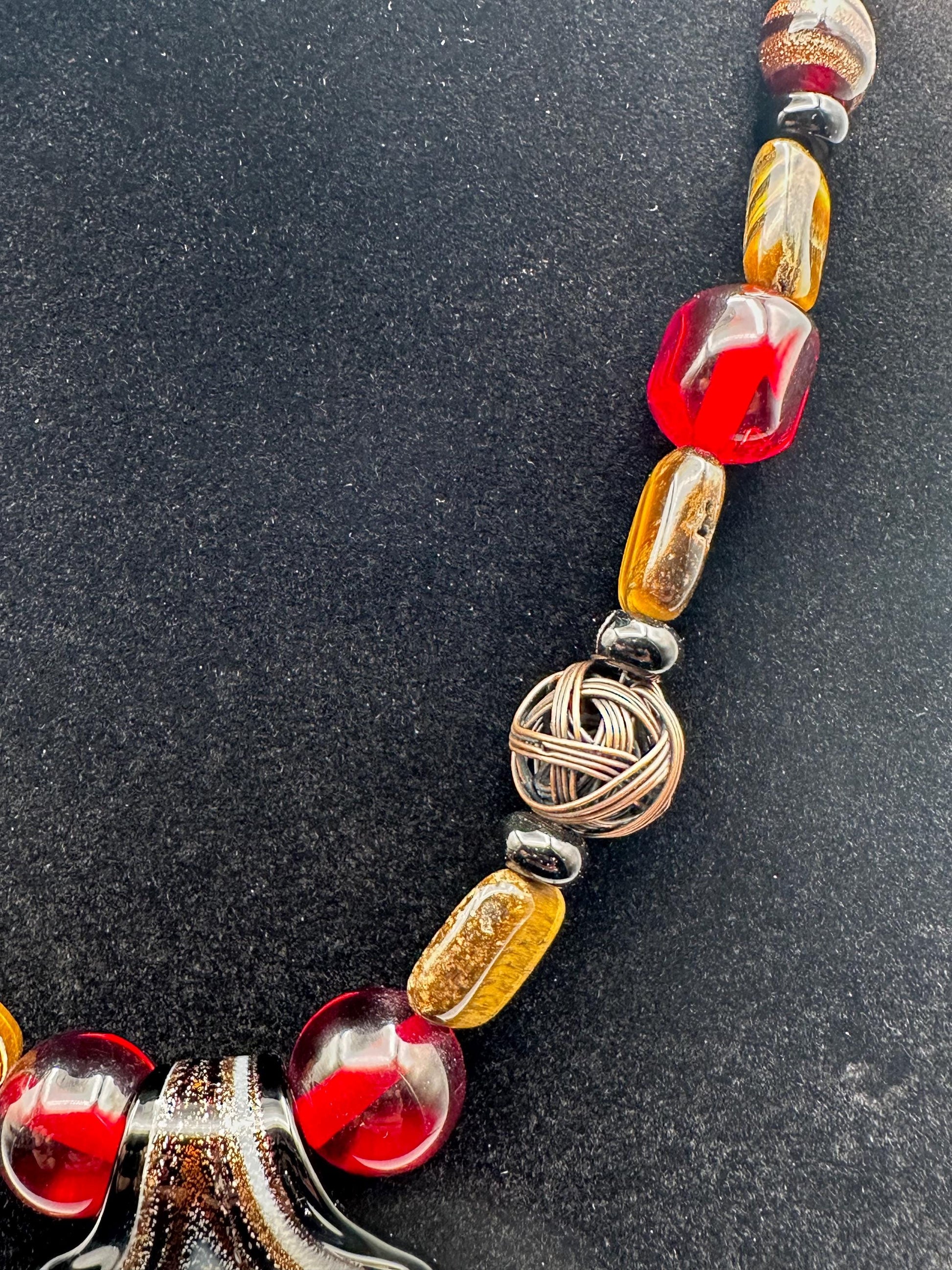 Vintage Murano-Style Glass Bead Necklace: Swirl Leaf Pendant in Amber, Red & Black - Artisan Bohemian Jewelry