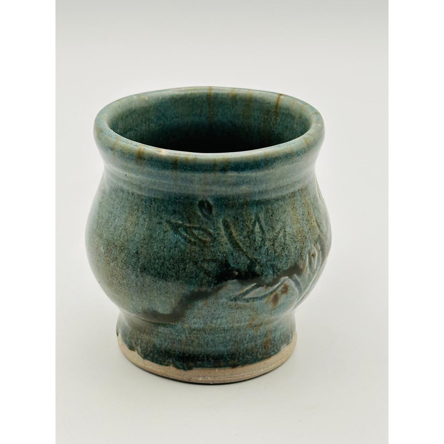 Handmade Artisan Pottery Mug – Blue Green Glaze with Raised Decorative Pattern