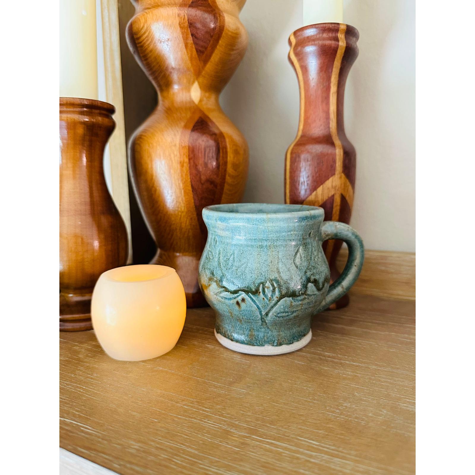 Handmade Artisan Pottery Mug – Blue Green Glaze with Raised Decorative Pattern