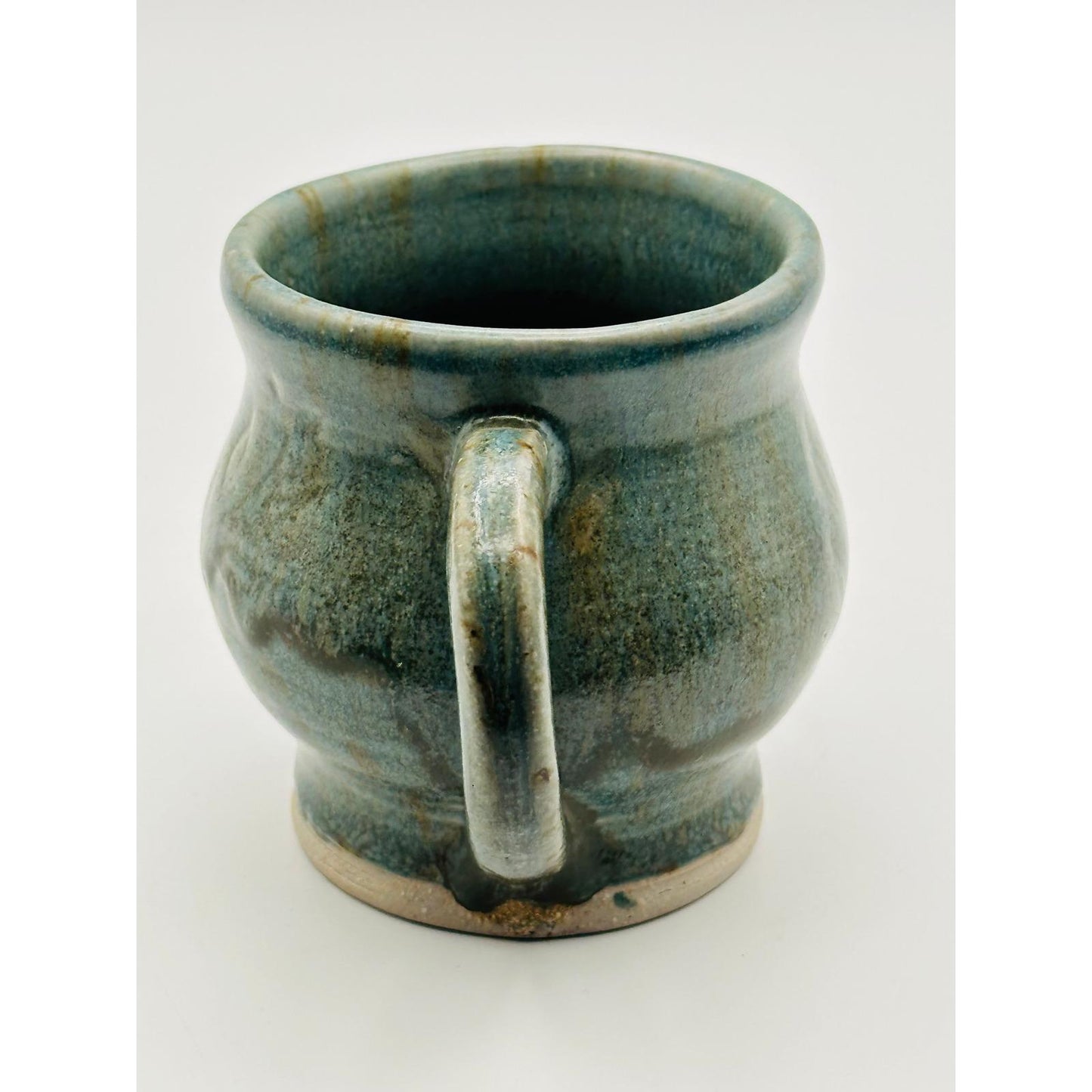 Handmade Artisan Pottery Mug – Blue Green Glaze with Raised Decorative Pattern