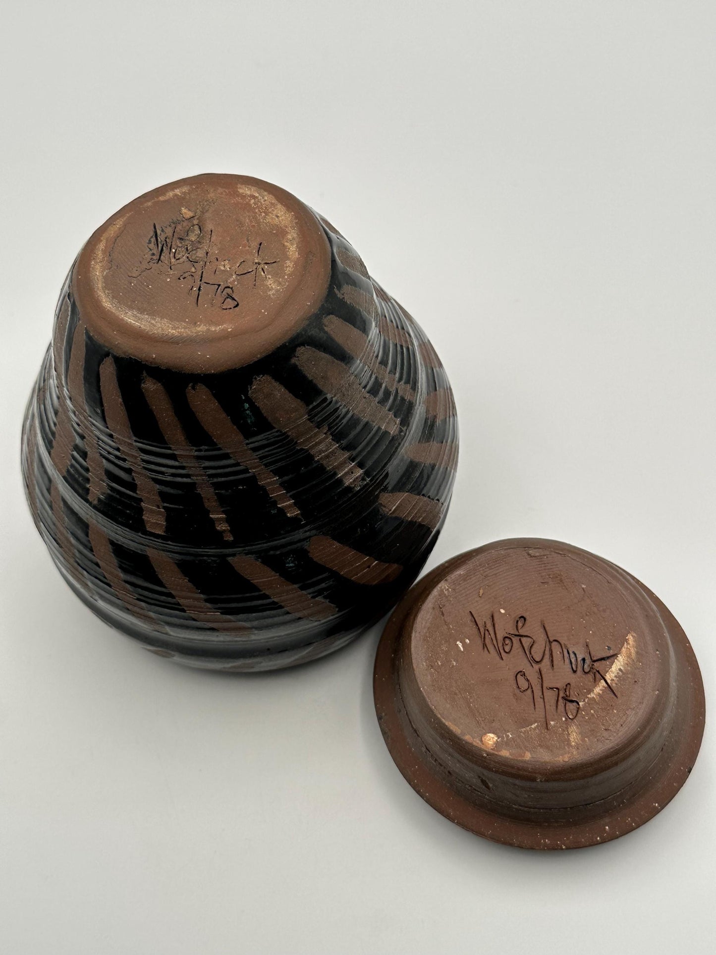 Artisan-Signed Rustic Stoneware Jar: Brown & Black Striped Pottery Vessel with Lid