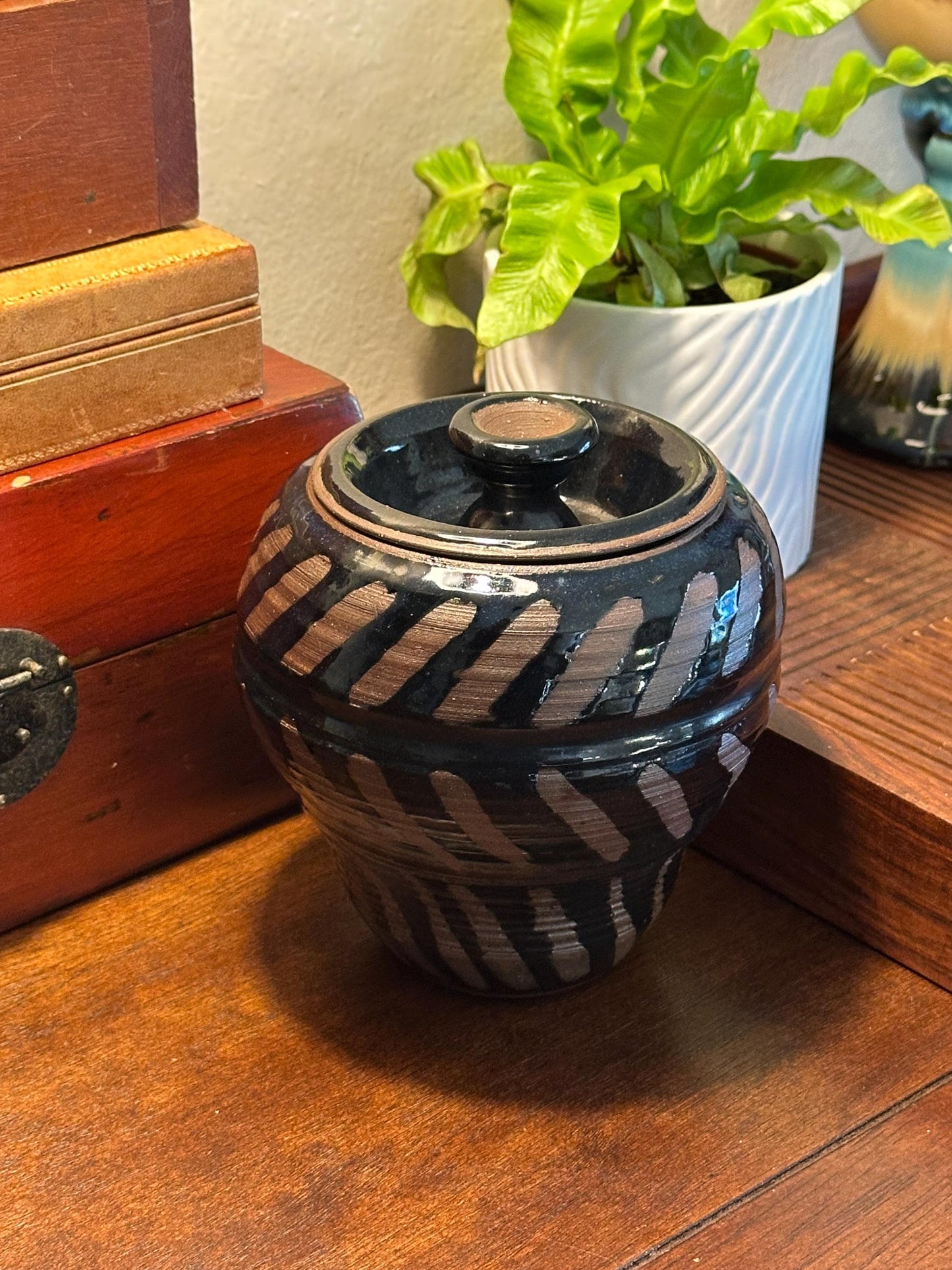 Artisan-Signed Rustic Stoneware Jar: Brown & Black Striped Pottery Vessel with Lid