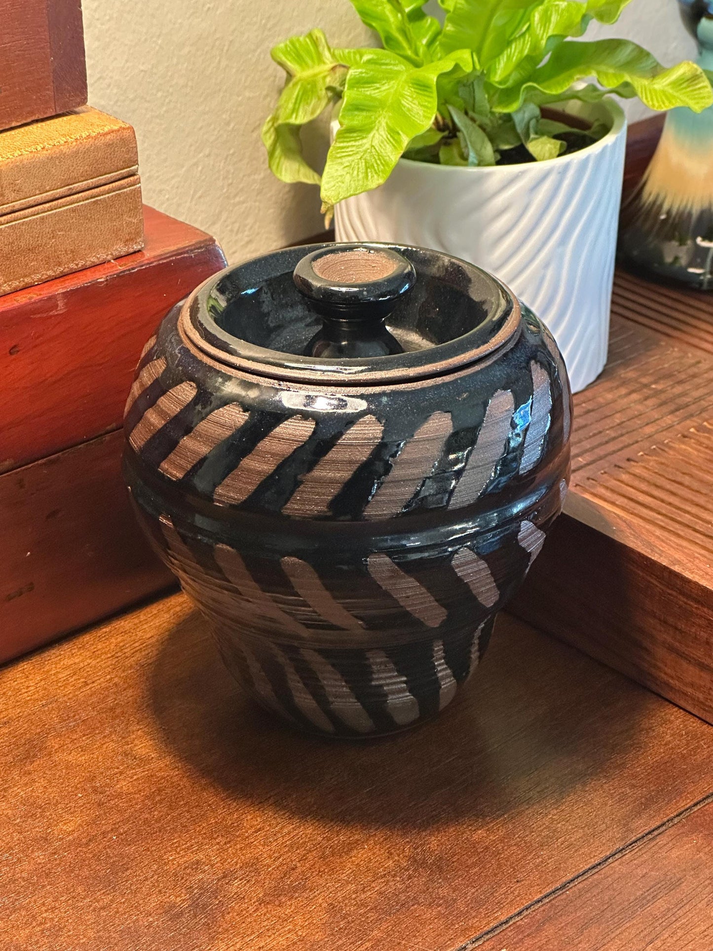 Artisan-Signed Rustic Stoneware Jar: Brown & Black Striped Pottery Vessel with Lid